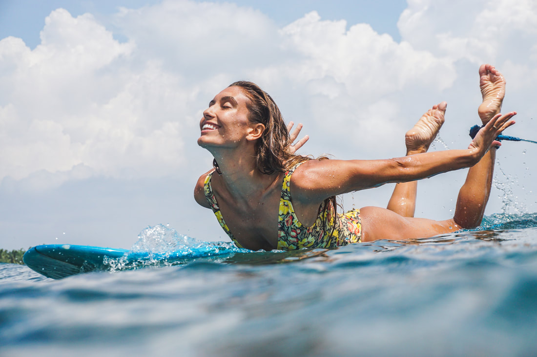 HAPPY SMILING SURFER GIRL